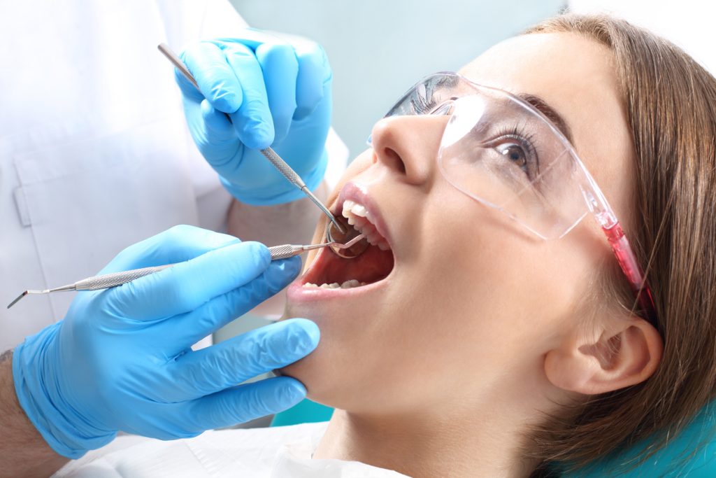 young patient smiling wearing braces